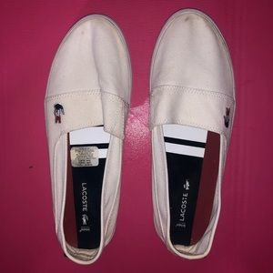 White Lacoste Slip Ons